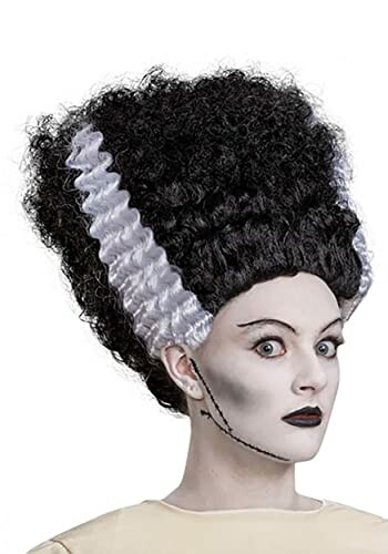 Person in Bride of Frankenstein costume with tall black hair and white streaks