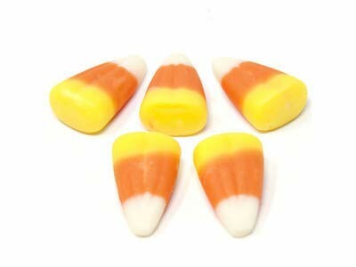 Five pieces of candy corn arranged in a circle