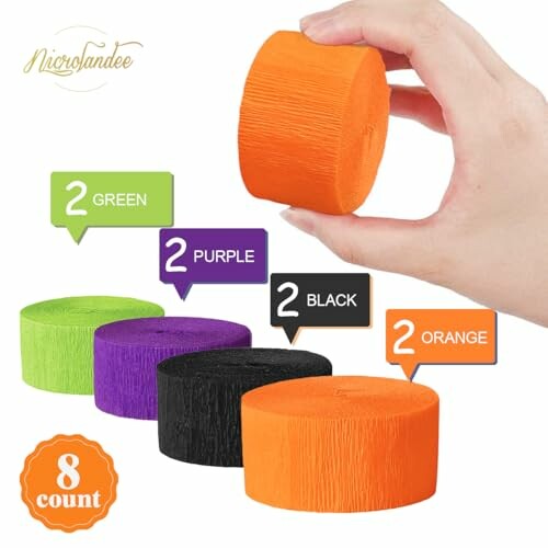 Hand holding orange crepe paper roll, with green, purple, black, and orange rolls displayed.