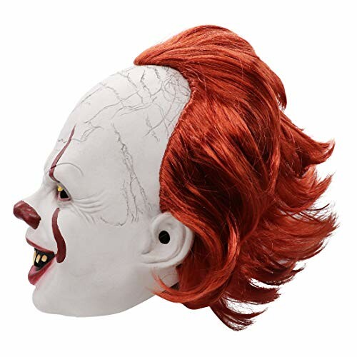 Side view of a clown mask with red hair and white face