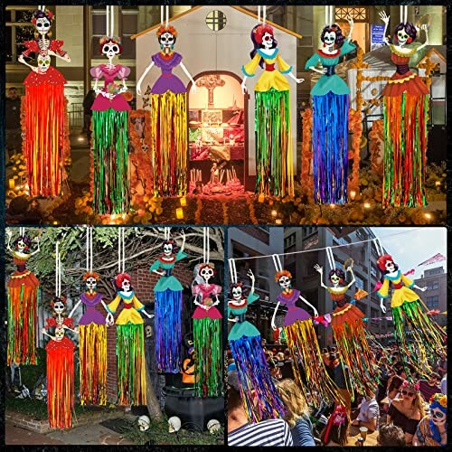 Colorful Day of the Dead decorations with skeleton figures in vibrant outfits.