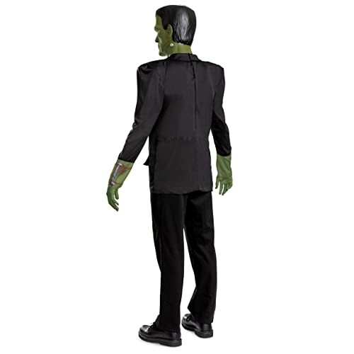 Back view of a Frankenstein costume with black suit and green hands.