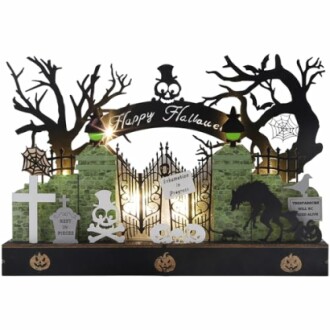 Halloween cemetery decoration with tombstones and skeleton