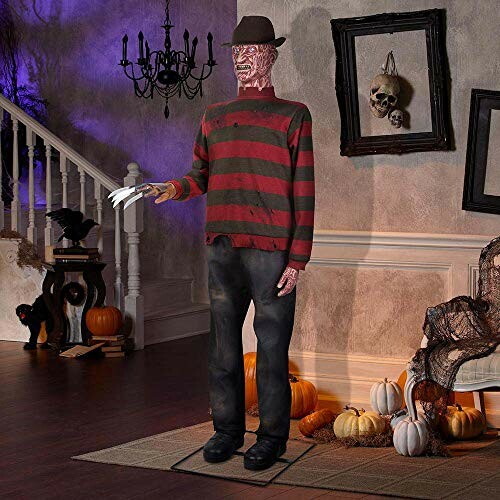 Freddy Krueger Halloween decoration with pumpkins and spooky decor