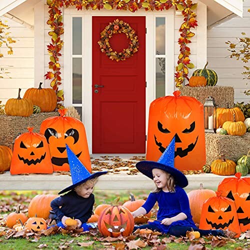 Children in witch costumes with pumpkins and Halloween decorations on porch.