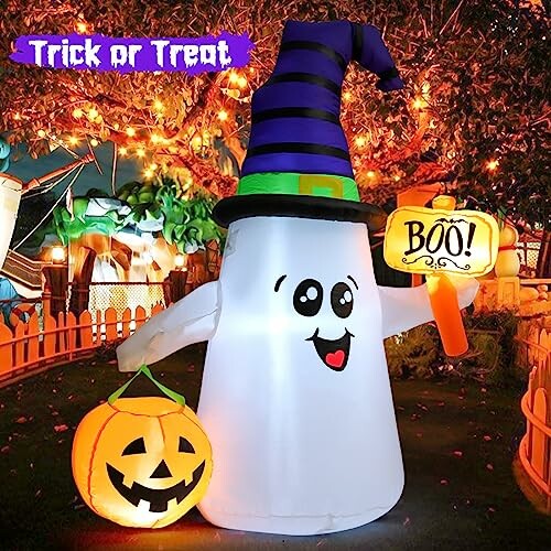 Inflatable ghost with witch hat and pumpkin for Halloween.