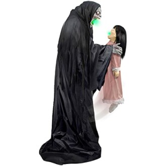 Grim Reaper figure holding a child for Halloween decoration.