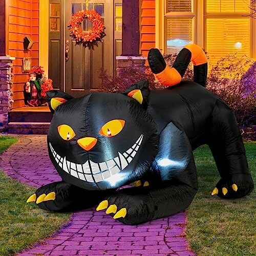 Inflatable black cat decoration on a porch for Halloween.