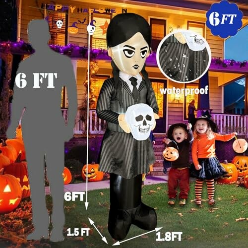 6-foot Halloween inflatable decoration in front of house with kids and pumpkins.