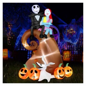 Halloween inflatable display with characters and pumpkins.