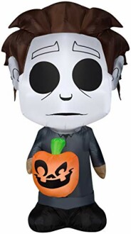 Cartoon inflatable figure with pumpkin for Halloween decoration.