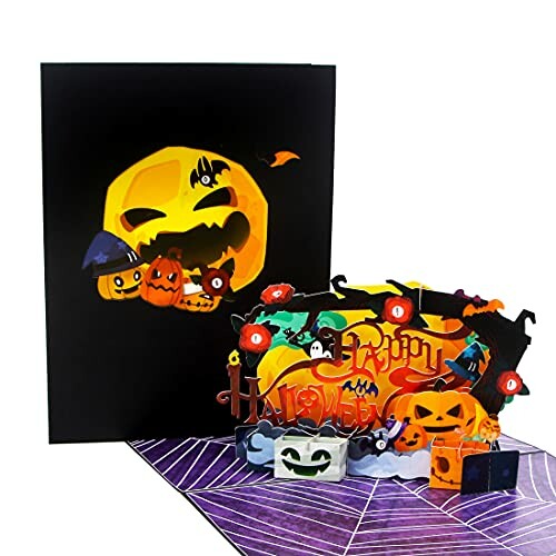 Halloween pop-up card with pumpkins and spooky decorations.