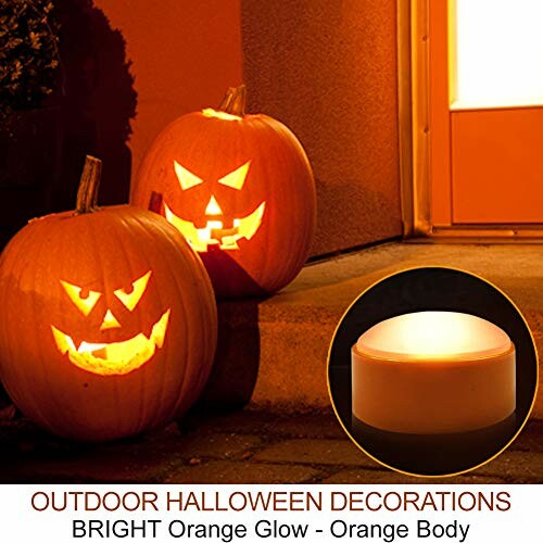 Two carved pumpkins with glowing faces near a door, outdoor Halloween decoration.