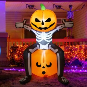 Inflatable skeleton with pumpkin head Halloween decoration.