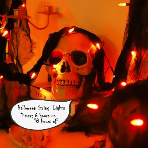 Halloween skull with orange string lights and spooky decor