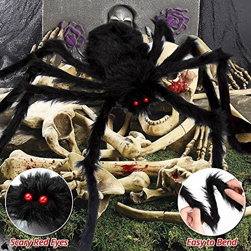 A large black spider with red eyes on a pile of bones.