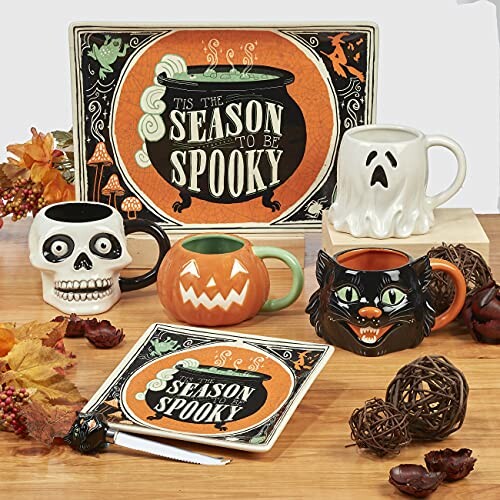 Halloween-themed mugs with a spooky sign and autumn decor.