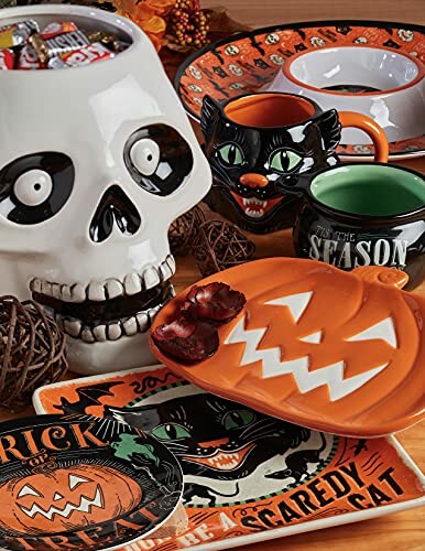 Halloween-themed tableware with skull, black cat, and pumpkin designs.