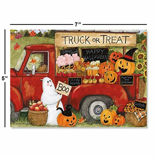 Red truck with Halloween decor, ghost, pumpkins, and candy.