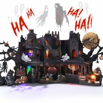 Spooky haunted house with ghosts and Halloween decorations