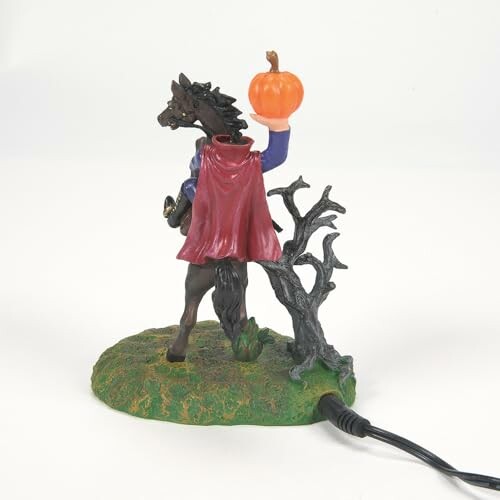 Headless horseman figurine lamp with pumpkin and tree