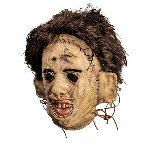 Realistic horror movie mask with stitches and dark hair