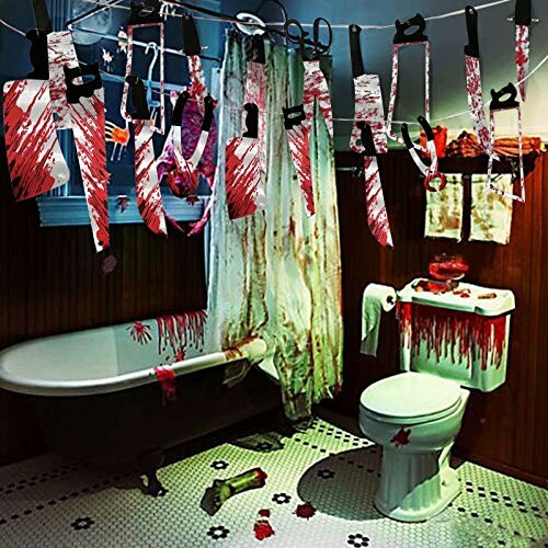 Bathroom with horror-themed decorations, including blood-stained shower curtain and fake blood splatters.