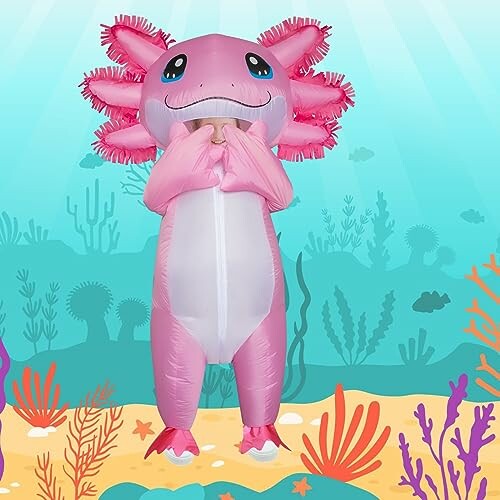 Person in inflatable pink axolotl costume underwater background