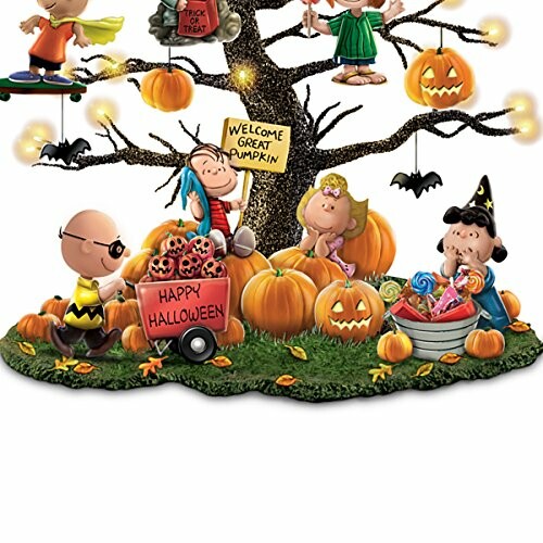 Peanuts characters celebrating Halloween with pumpkins and decorations.