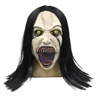 Frightening mask with long black hair and yellow eyes