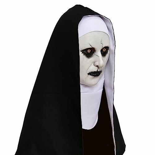 Person in a scary nun costume with white face paint and dark eye makeup.