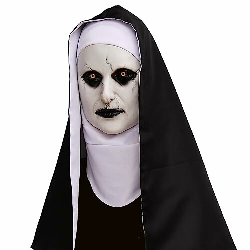 Person in a scary nun costume with white face paint and dark eyes.