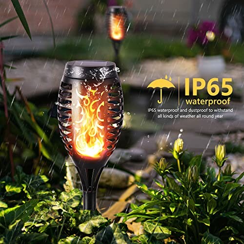 Solar torch light with IP65 waterproof rating in a garden setting.