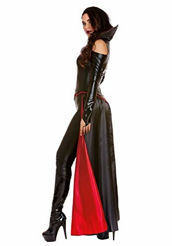 Woman in vampire costume with black and red cape