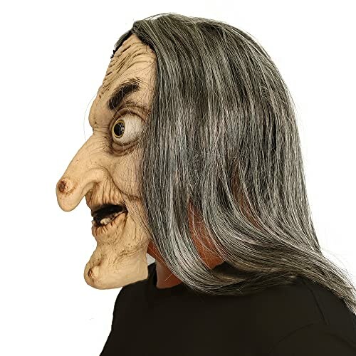 Side view of a witch mask with long gray hair.