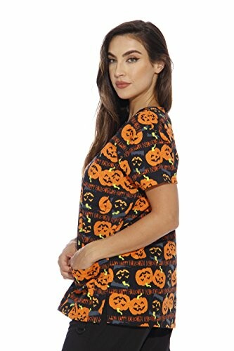 Woman wearing a Halloween-themed shirt with pumpkin designs