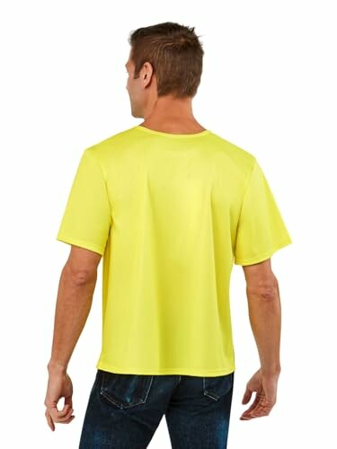 Back view of a person wearing a yellow t-shirt and jeans